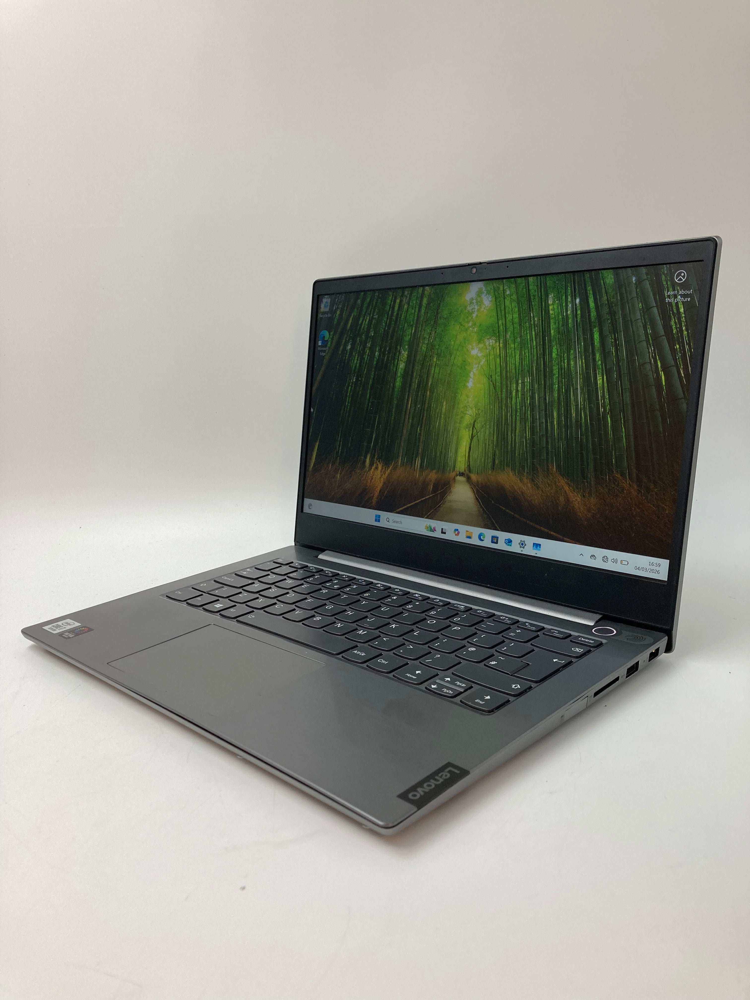 Lenovo ThinkBook 14-IIL front angled view showing keyboard and 14" screen