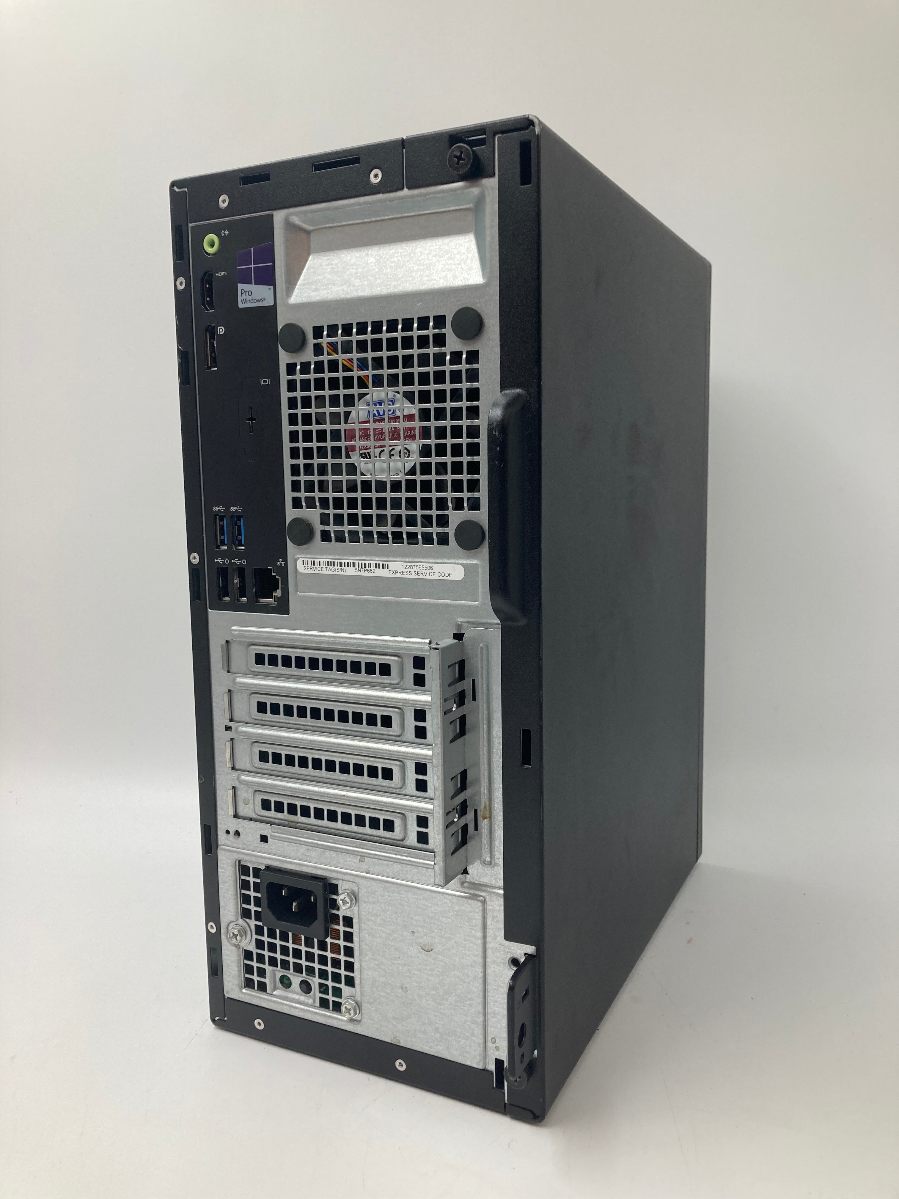 Dell Optiplex 3040 ack angled view showing HDMI, display, USB, ethernet and power cable ports