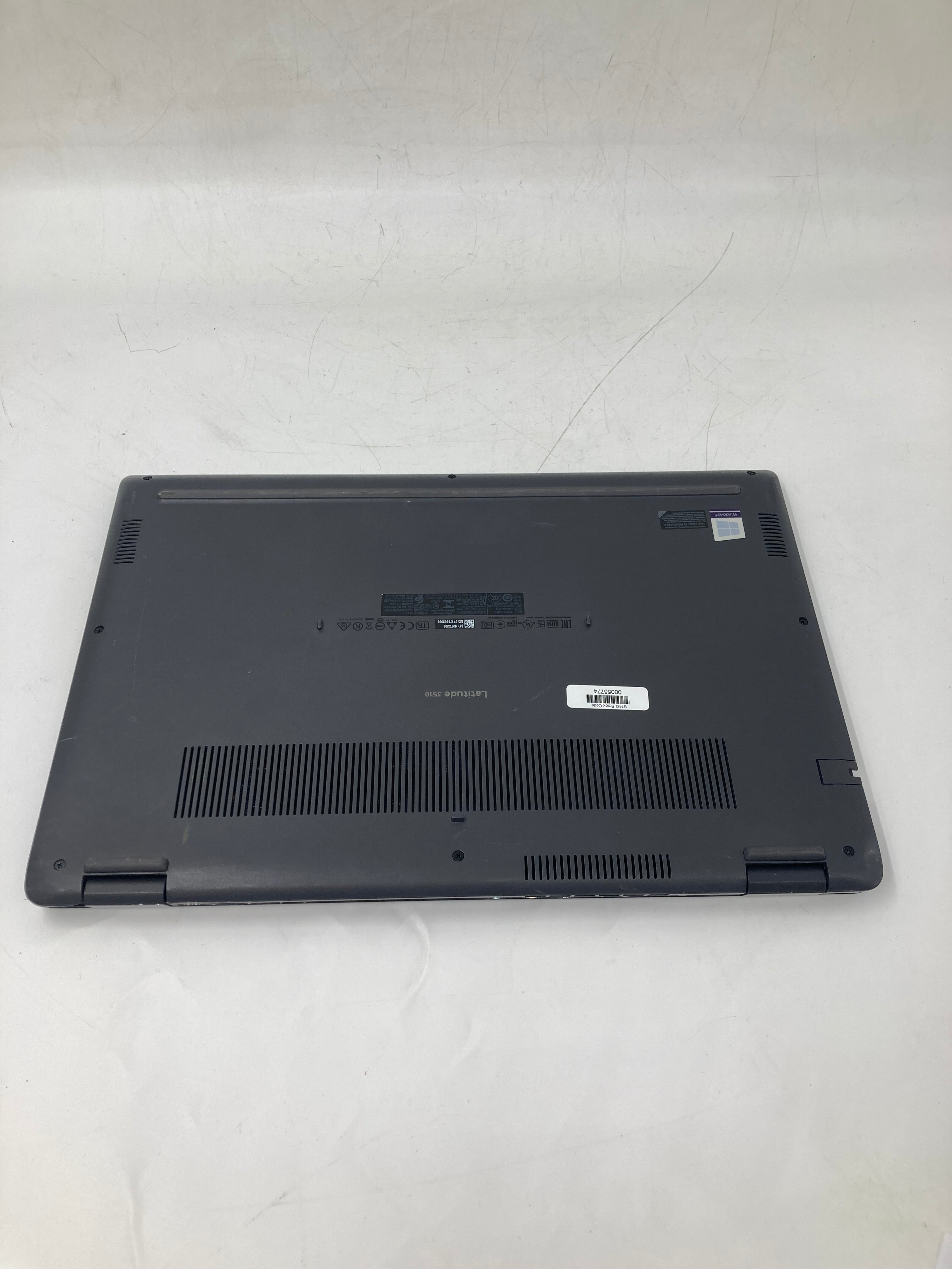 dell latitude 3510 bottom housing showing model number and vents