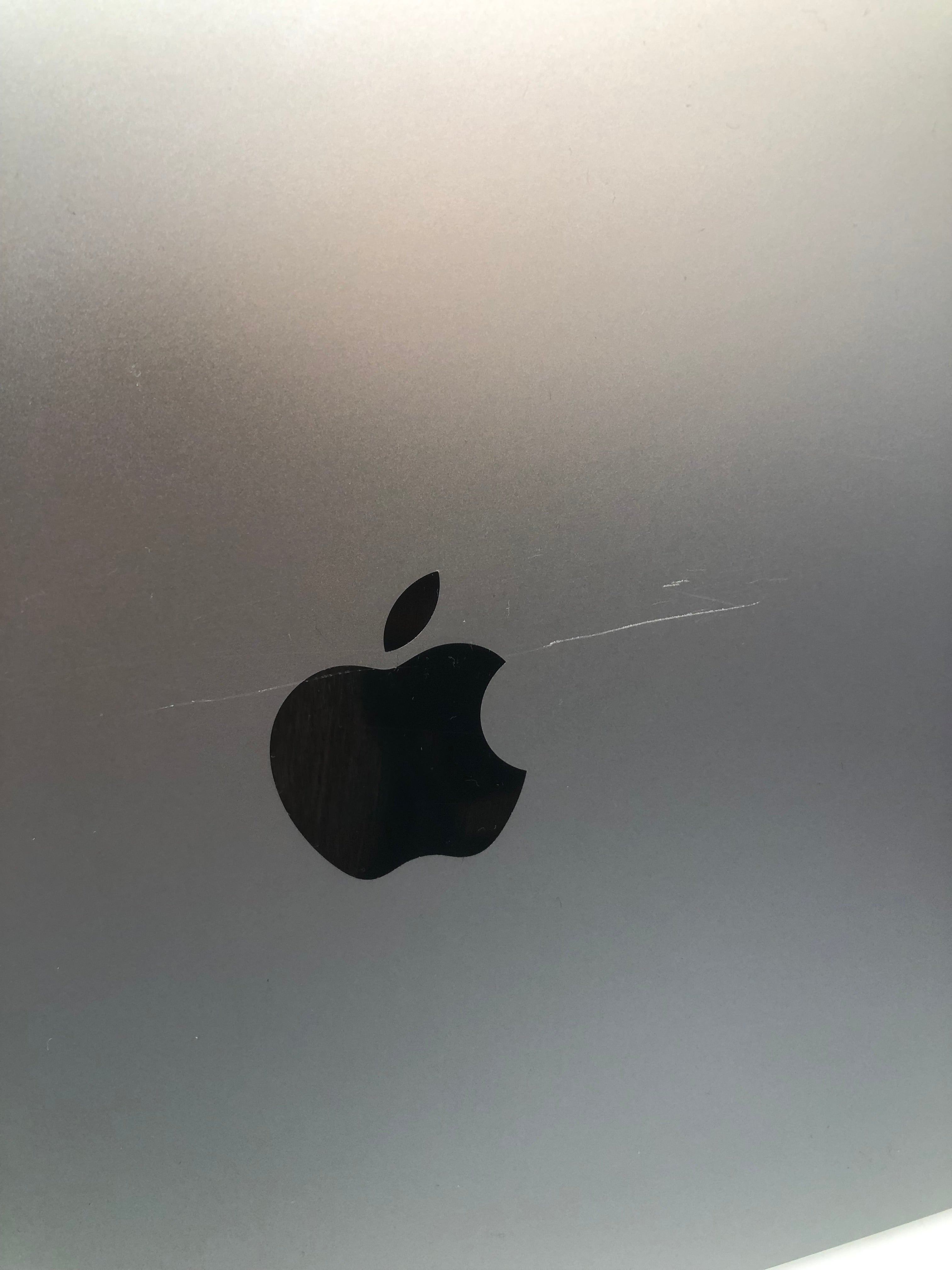 Apple MacBook Pro 2019 close up view of scratch on lid
