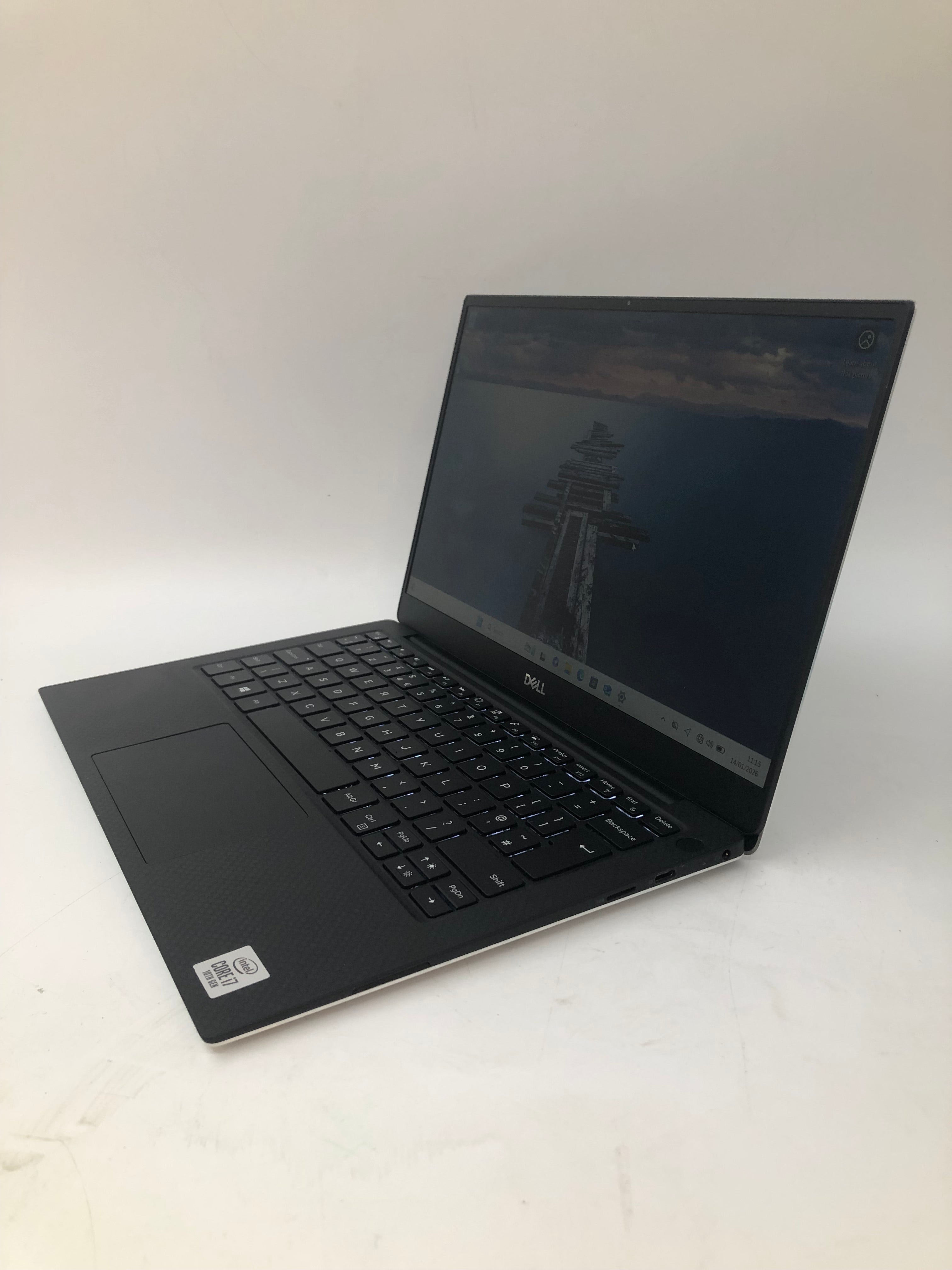 Dell XPS 13 7390 front angled view showing keyboard and 13" screen