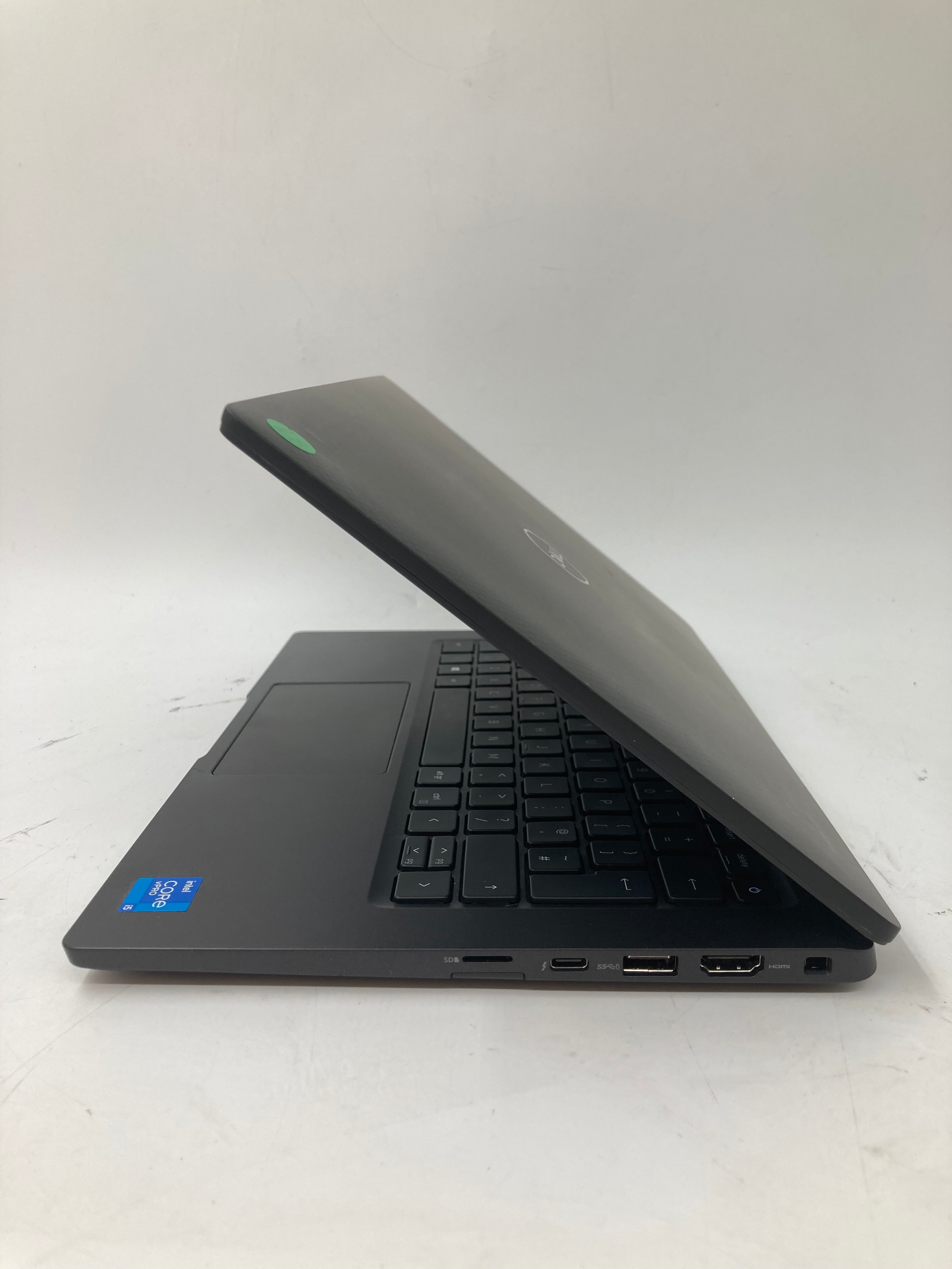 Dell Latitude 7320 side view showing SD, USB, HDMI, and charger ports