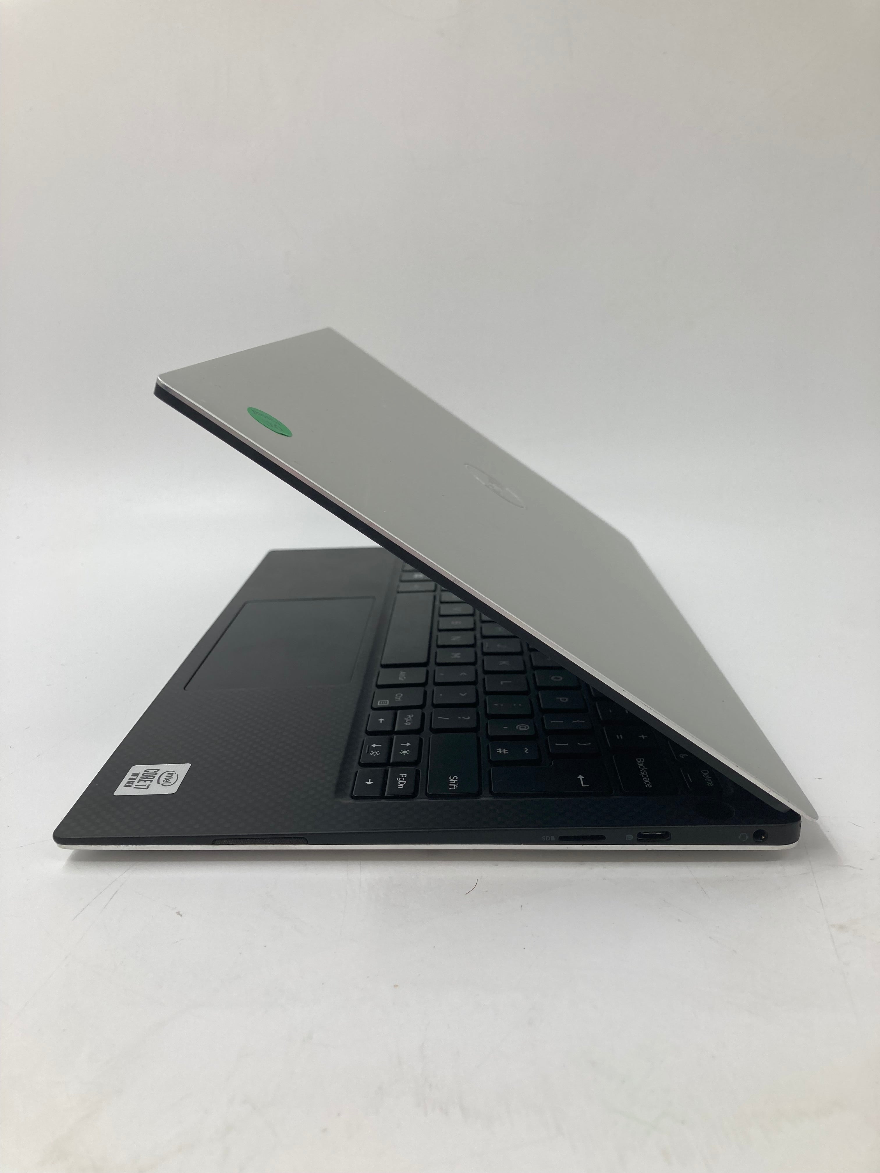 Dell XPS 13 7390 side view showing SD, charger and headphone ports