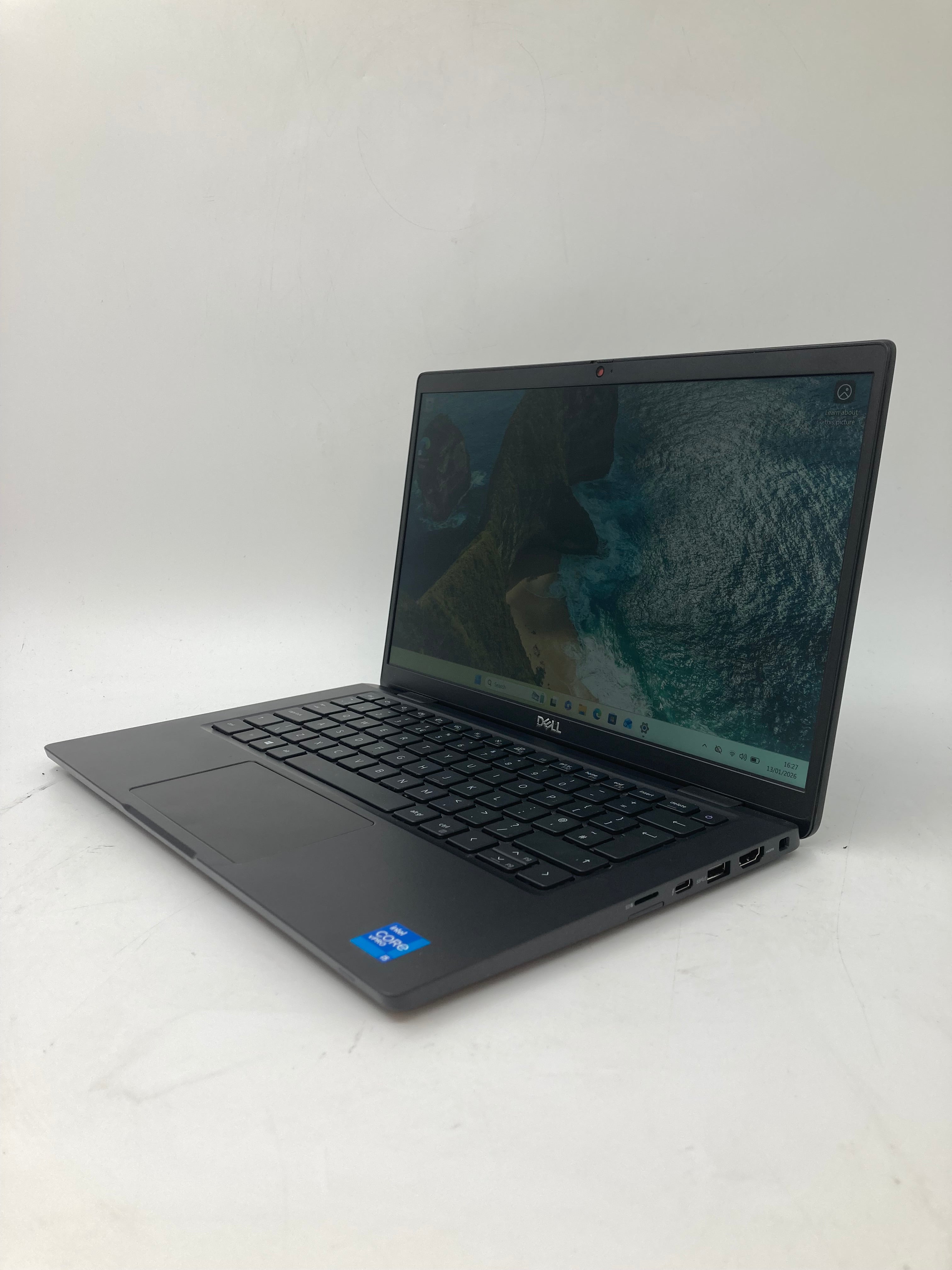 Dell Latitude 7320 front angled view showing 13" screen and full size keyboard