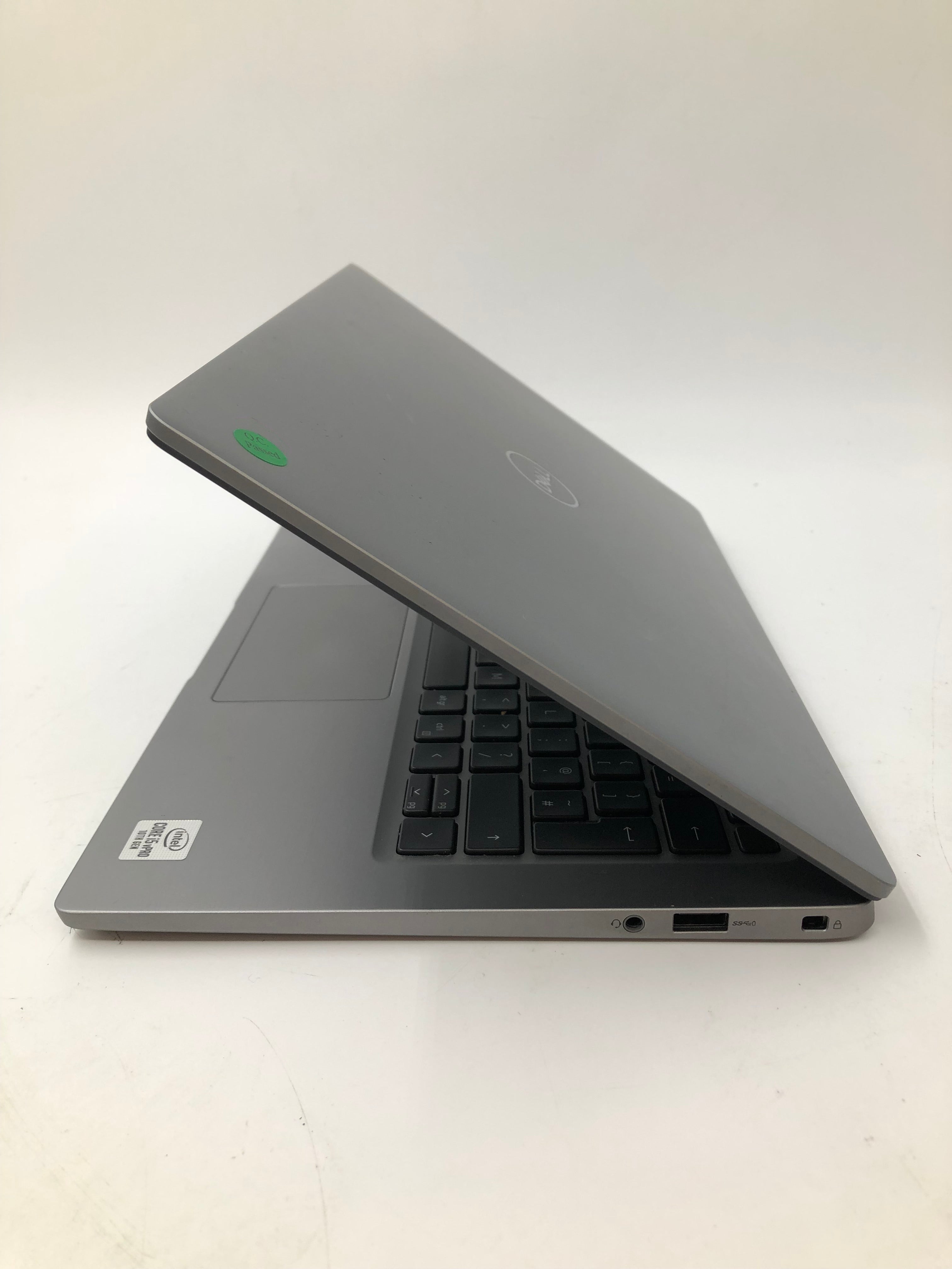 Dell Latitude 7310 side view showing headphone and USB ports