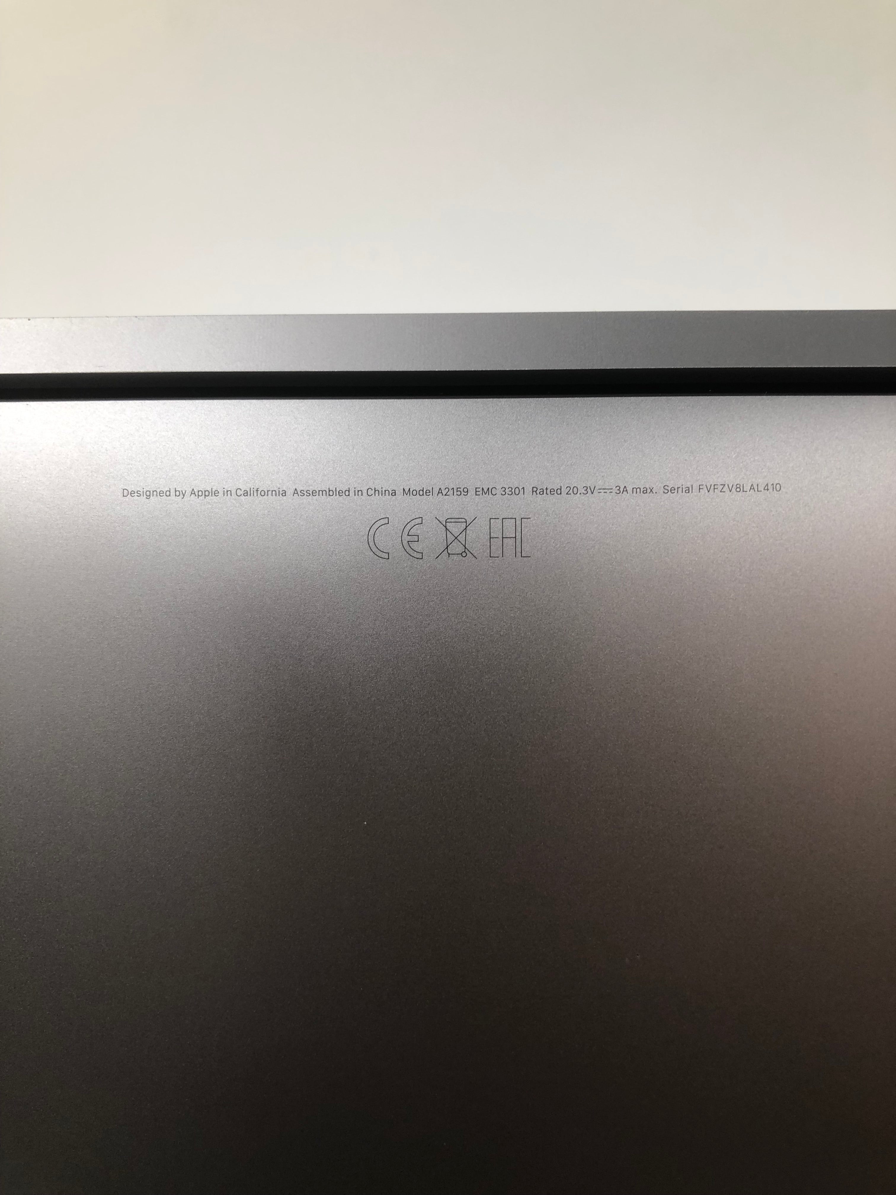 Apple MacBook Pro 2019 close up view of model and serial number