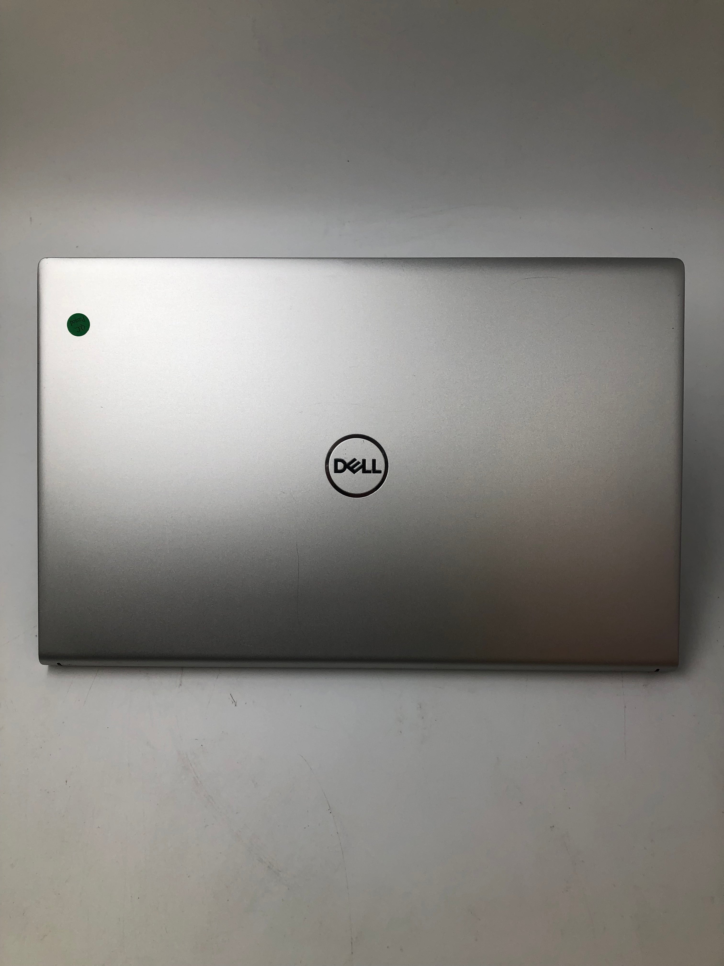 Dell Inspiron 15 5510 top view showing logo and light marks