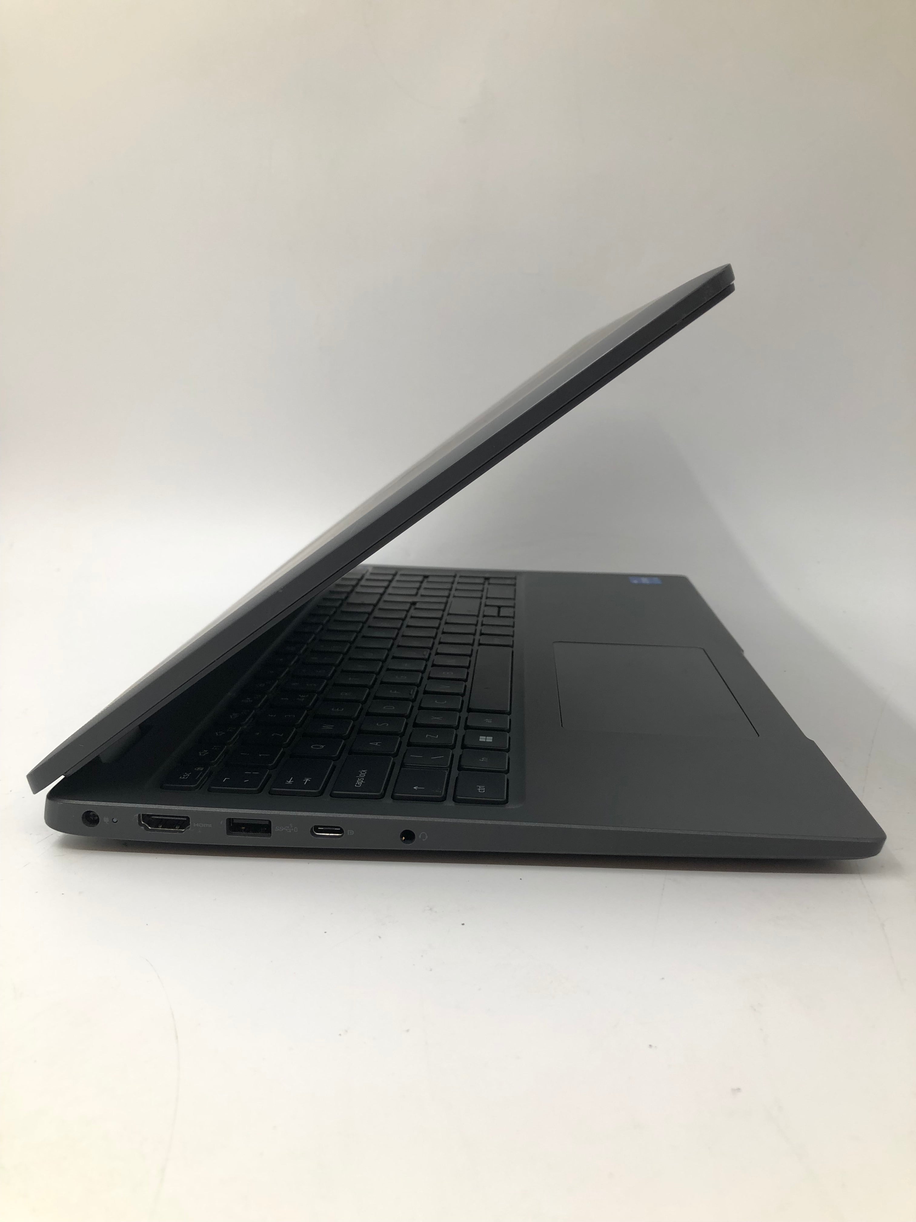 Dell Latitude 3540 side view showing HDMI, USB, charging and headphone ports