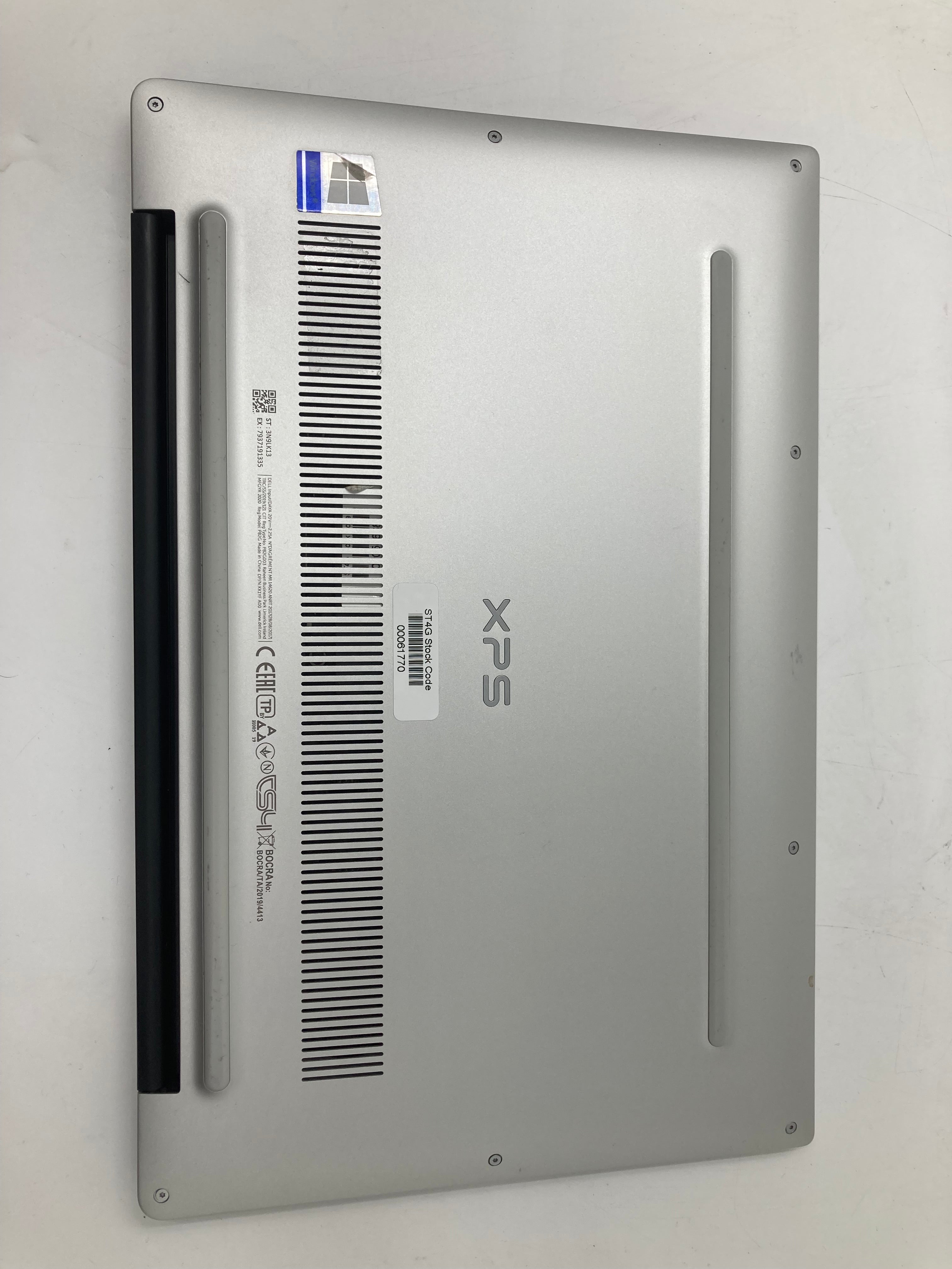 Dell XPS 13 7390 bottom housing view of vent and XPS logo