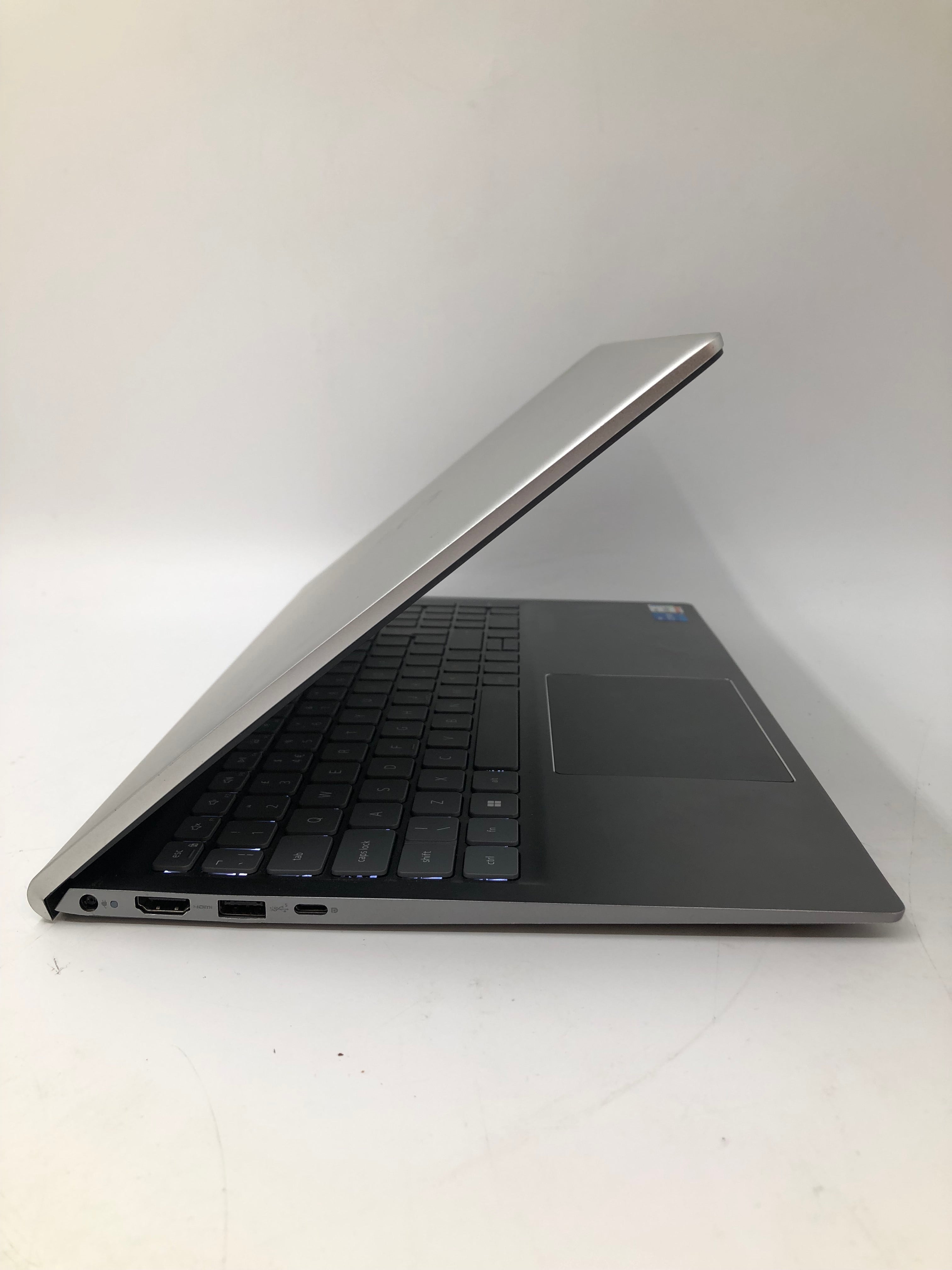 Dell Inspiron 15 5510 side view showing HDMI, USB, and charging ports