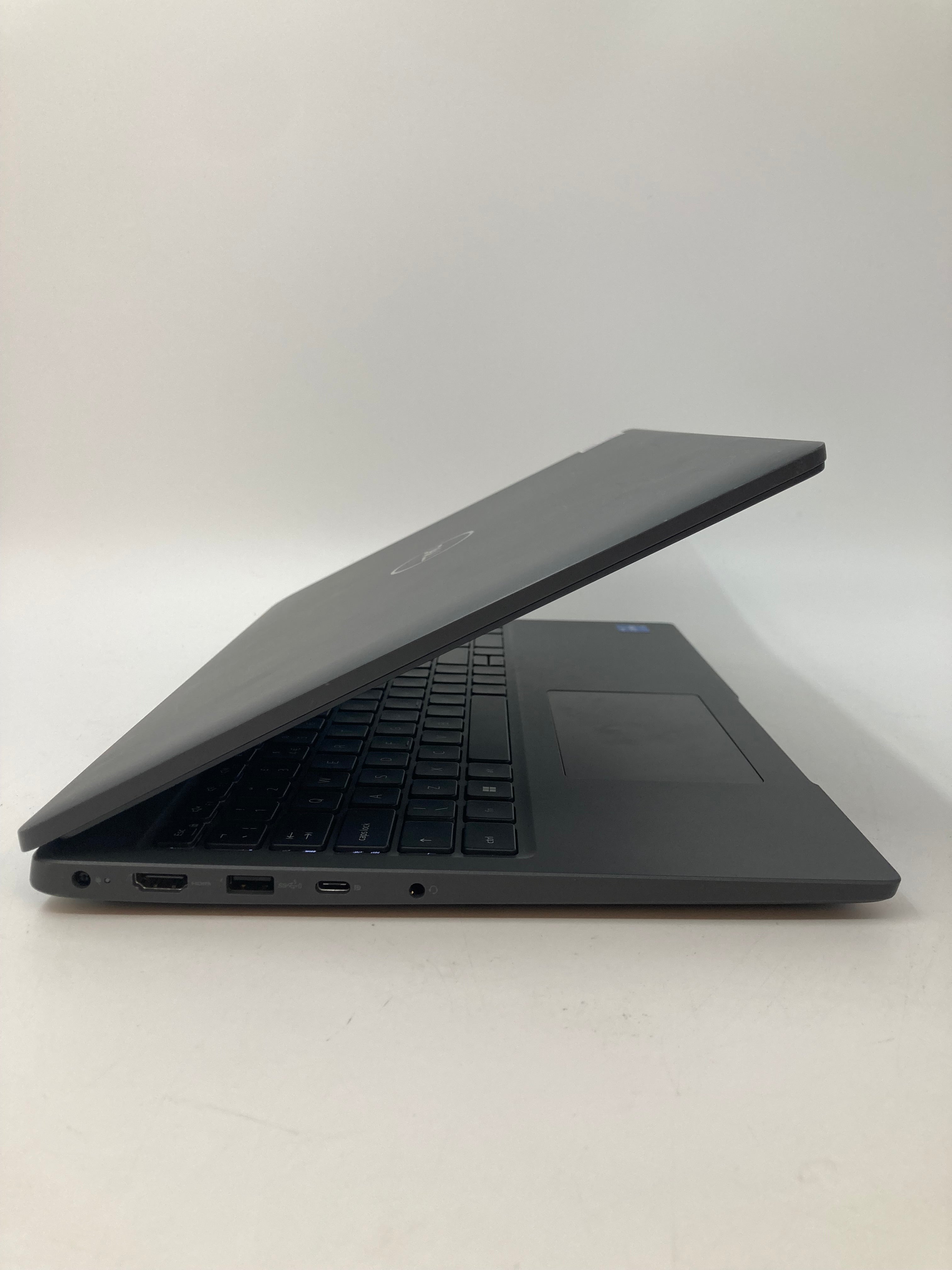 Dell Latitude 3540 side view showing charging, HDMI, USB, USB-C, and AUX ports